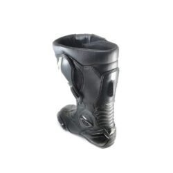 A pair of used black Alpinestars S-MX 5 SE leather racing boots in size 44. In very good condition with minor scratches, they feature comprehensive protection for the toes, heel, ankles, and shin, and are designed to be waterproof.