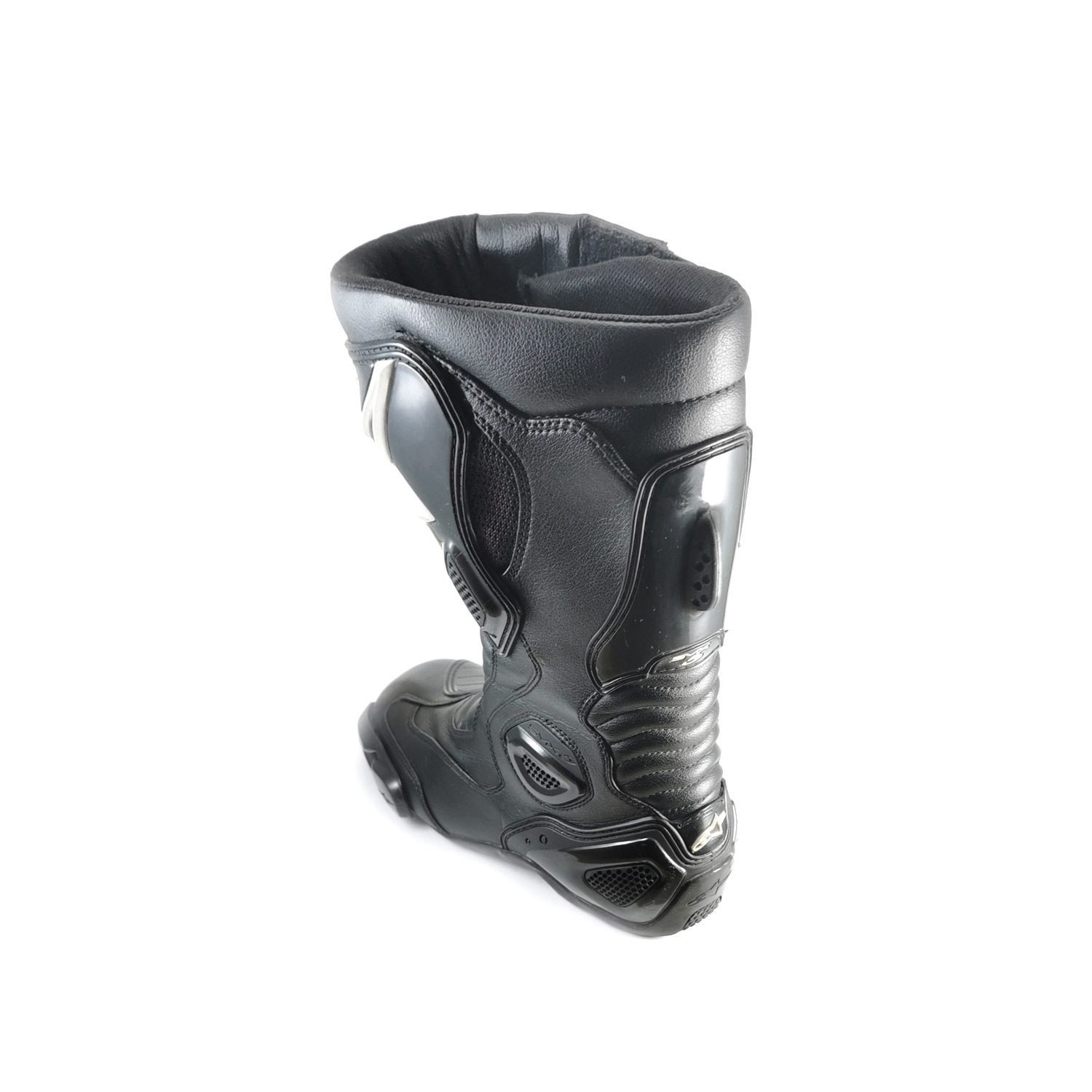 A pair of used black Alpinestars S-MX 5 SE leather racing boots in size 44. In very good condition with minor scratches, they feature comprehensive protection for the toes, heel, ankles, and shin, and are designed to be waterproof.