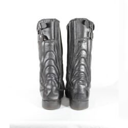 A pair of used black vintage touring motorcycle boots, size 42, made of leather with visible wrinkling and minor scratches on the surface. The boots feature reinforced toe and gear lever protection.