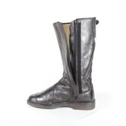 A pair of used black vintage touring motorcycle boots, size 42, made of leather with visible wrinkling and minor scratches on the surface. The boots feature reinforced toe and gear lever protection.