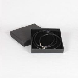 A black Nappa leather bracelet with a silver clasp, showcasing its sleek 4mm width and minimalist unisex design, displayed against a neutral background to highlight its elegant and versatile appeal for motorcyclist