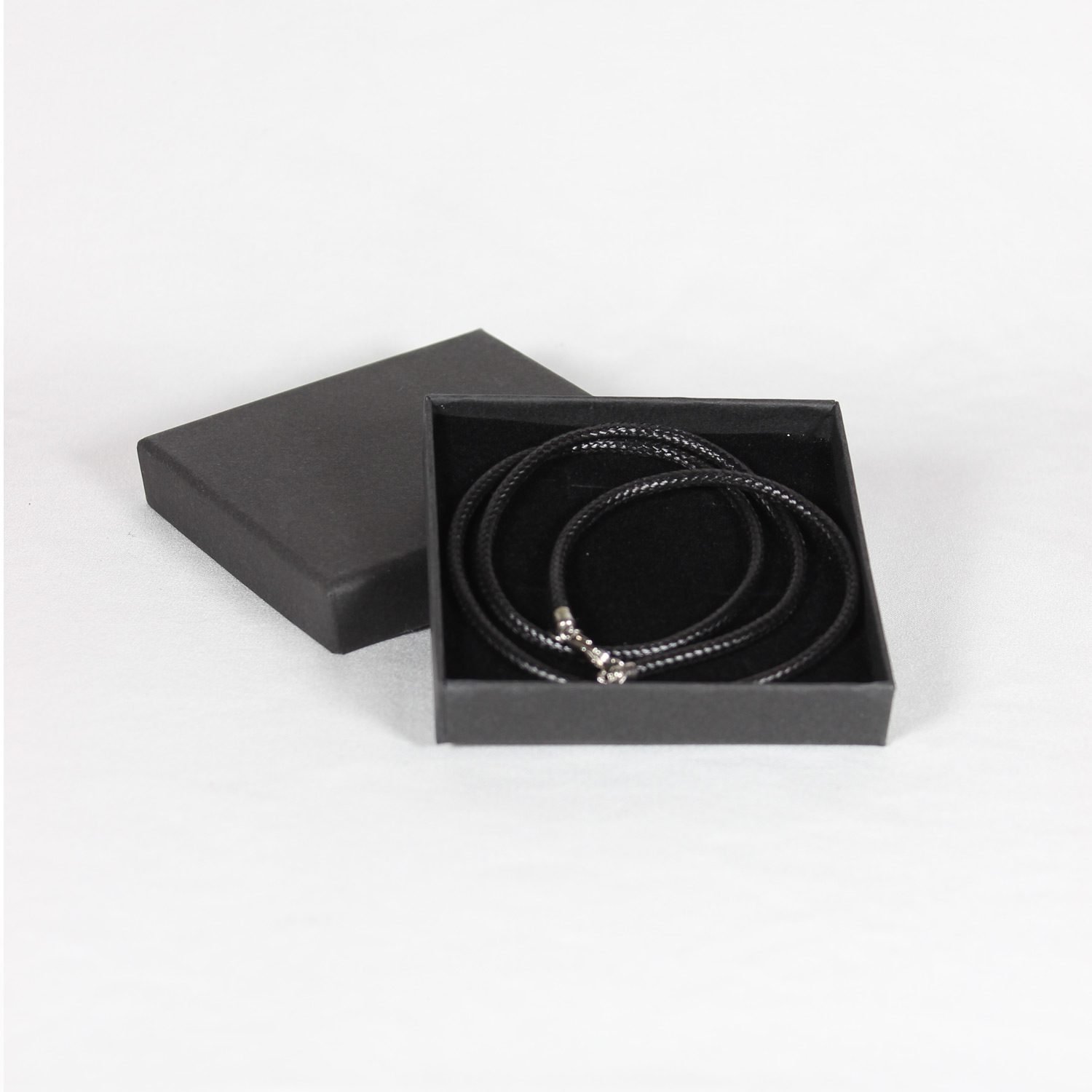 A black Nappa leather bracelet with a silver clasp, showcasing its sleek 4mm width and minimalist unisex design, displayed against a neutral background to highlight its elegant and versatile appeal for motorcyclist