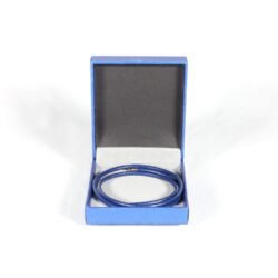 A royal blue Nappa leather watch strap with a stainless steel buckle, shown alongside a watch face to demonstrate its sleek and versatile design.