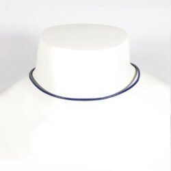 A royal blue Nappa leather watch strap with a stainless steel buckle, shown alongside a watch face to demonstrate its sleek and versatile design.