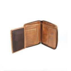vintage brown leather men's wallet, open to show card slots and money clip, on a dark background