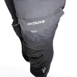 Used Büse black textile adventure pants with knee protection, a Sympatex waterproof membrane, ventilation vents, and a detachable thermal liner.