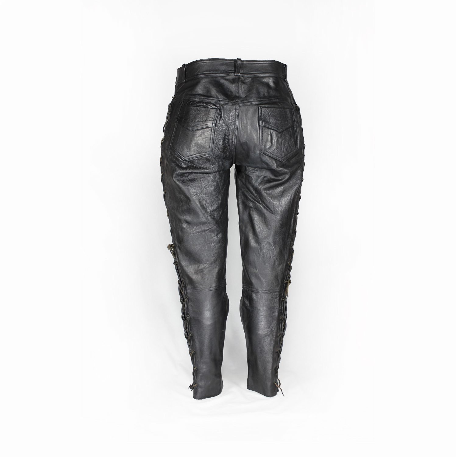 Used Damen Leathers black vintage leather pants with an adjustable leg string for fit, showing minor scratches and wrinkles from age.