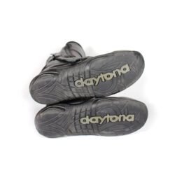 A pair of used black Daytona Spirit XCR touring and city boots in size 42, crafted from leather with comprehensive protection for heel, toes, gear lever, ankle, and calf. Features a waterproof membrane and is in good overall condition with no major defects