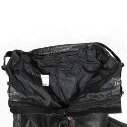 A pair of used black Hein Gericke leather pants in a vintage Café Racer style, size 56 (94 cm waist). In good condition (7.5/10) with minor use marks. Features include soft foam knee protection, an adjustable waist with a stretch panel and built-in belt, two front pockets, and a short connecting zip for a motorcycle jacket.