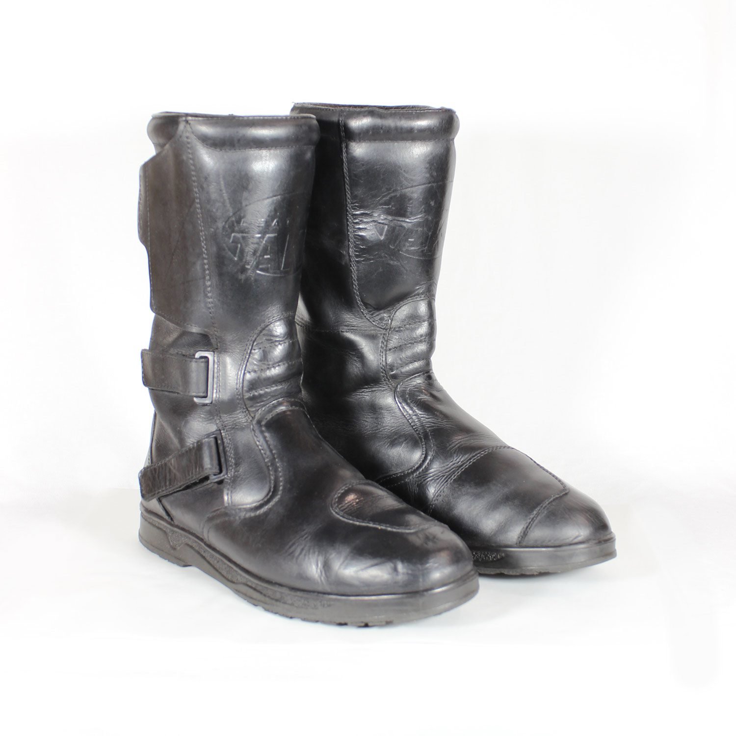 Black leather touring adventure motorcycle boots, size 42, showing small scratches and a light bend on the toe protection
