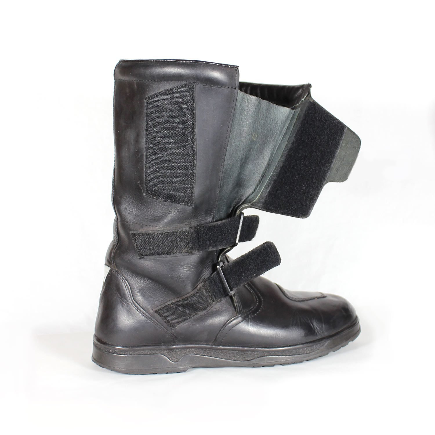 Black leather touring adventure motorcycle boots, size 42, showing small scratches and a light bend on the toe protection