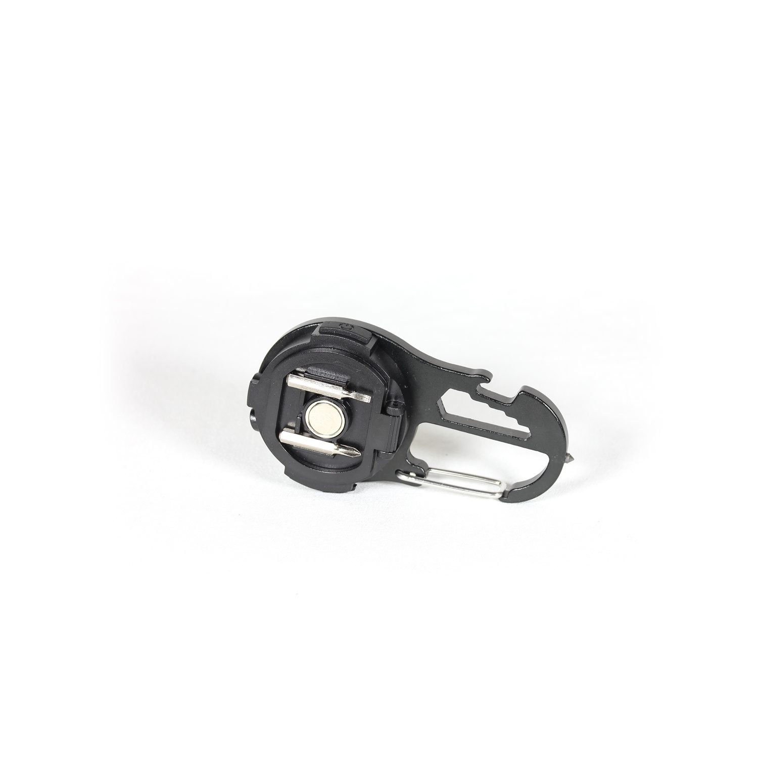 A compact black keychain flashlight with a magnetic base, shown attached to a metal surface, highlighting its USB-C port, dual LED lamps, and multifunctional lighting modes for outdoor use.