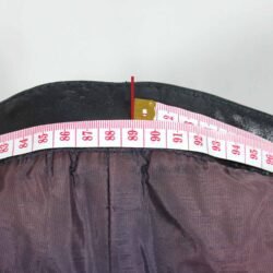 A 56-size dark blue leather city bike saddle in a vintage style. The saddle is in fair condition with general use marks and some discoloration on the white zip and inner liner. It features soft foam padding for protection at the hips and knees but is not waterproof.