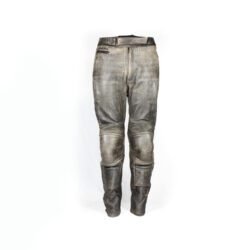 Used brown leather Modeka cafe-racer pants in size 54, featuring a stretch fit for an 82-86 cm waist. The condition is very good at 8.5/10 with only very minor surface scratches. Includes foam protectors at the knees and hips for safety. A distinctive vintage motorcycle trouser with a classic style