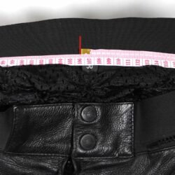 A pair of used black and blue Probiker racing leather pants in size 58 XXXL. In good condition with minor marks, they feature knee protection, a full-length zipper to attach a racing jacket, and placeholder Velcro for knee sliders.