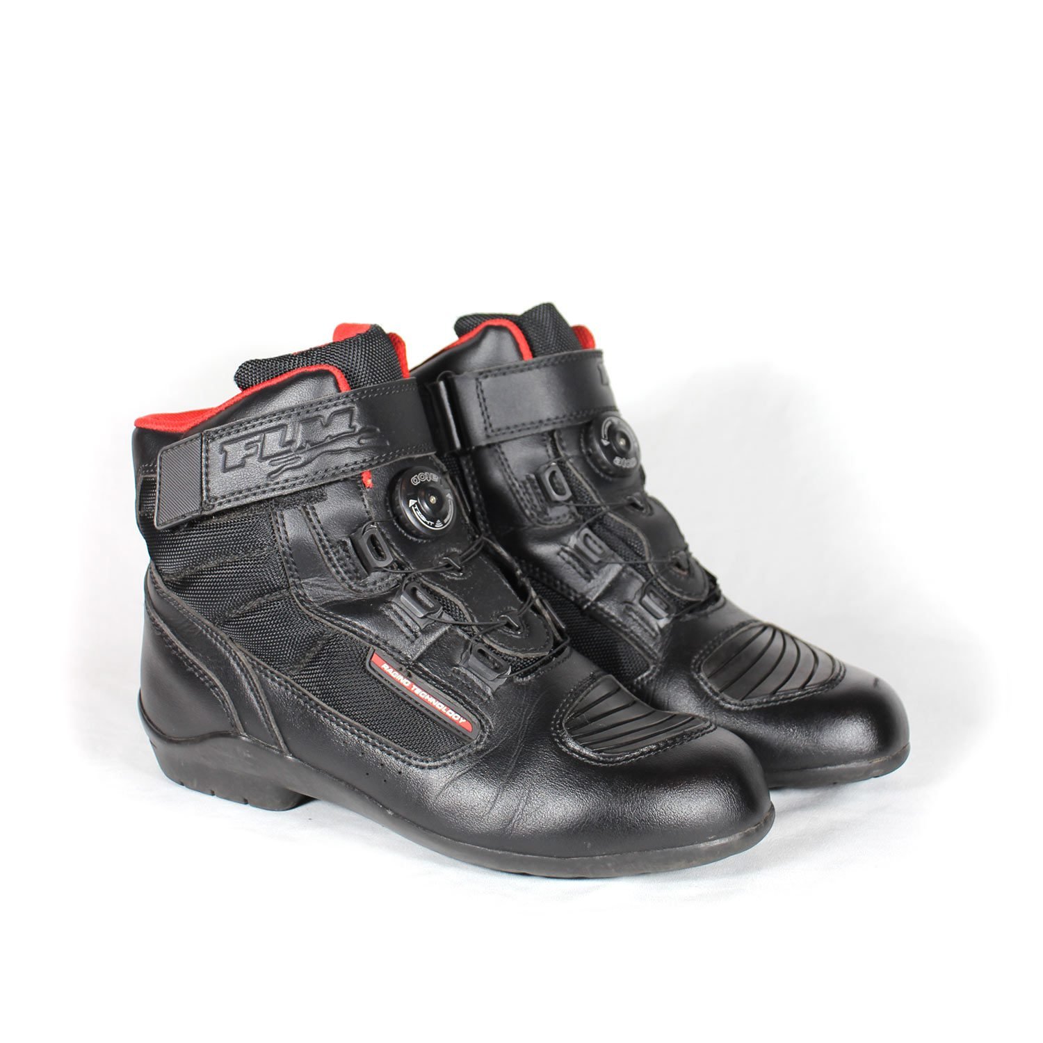A pair of used black FLM short street boots in size 41, designed for city riding. Constructed from faux leather and textile with protection for heel, toes, gear lever, and ankle. Features a waterproof membrane and shows minor scratches.
