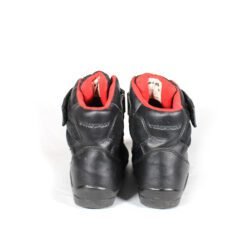 A pair of used black FLM short street boots in size 41, designed for city riding. Constructed from faux leather and textile with protection for heel, toes, gear lever, and ankle. Features a waterproof membrane and shows minor scratches.