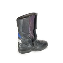 Used black and blue leather sports touring boots in size 43. Condition is fair at 6/10 with small scratches from normal use. Features protection for heel, toes, gear lever, ankle, and shin. The waterproof membrane is no longer functional.