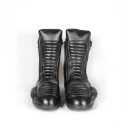 A pair of used black women's touring and street motorcycle boots in size 38, crafted from leather and faux leather with reinforced heel, toe, gear lever, and slider protection. Features a waterproof membrane and shows minor surface scratches.