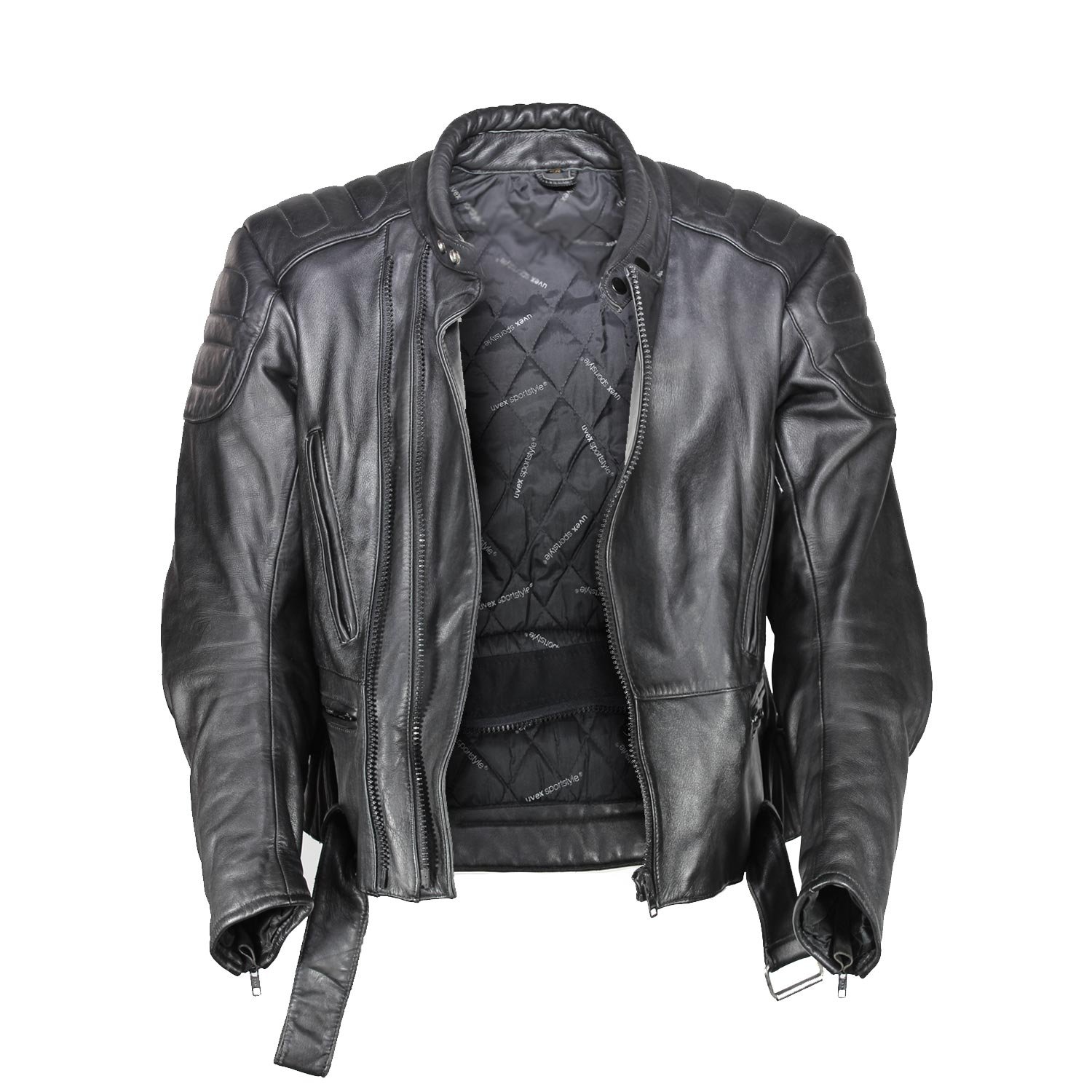 A used black Uvex Sportstyle vintage leather jacket in size 56. In very good condition with only minor aging marks, it features reinforced leather on the elbows, shoulders, and lower back, and a short zipper to connect to pants.