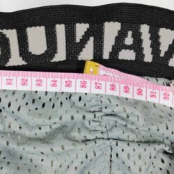 Used Vanucci black leather Café-Racer pants with hip and knee foam protection, featuring connection zippers and perforated ventilation. Shows minor wear and scratches.