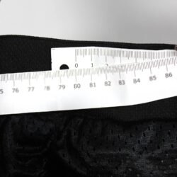 Used black and blue Vanucci Track racing leather pants in size 52, featuring a stretch fit for an 80-84 cm waist. Condition is good with very minor surface scratches. Includes foam knee protectors, thigh air vents, and connection zippers for a combi jacket. Features 3M Scotchlite reflective material and can be upgraded with knee sliders for a performance-focused race suit.