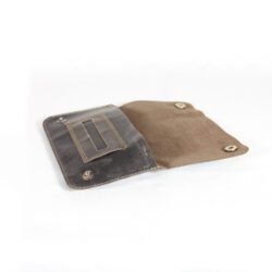 A vintage brown slim leather men's wallet open to show multiple card slots, a clear ID window, and a snap-button coin pocket, highlighting its RFID protection and minimalist design.