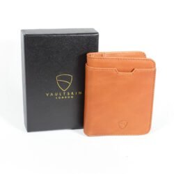 A sleek cognac-colored leather men's wallet, open to show multiple card slots and an exterior quick-access card pocket, showcasing its minimalist and sophisticated design.