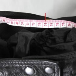 Used women's black leather Café-Racer pants with hip and knee foam protection, perforated leather behind the knees, and a combi-jacket connection zipper.