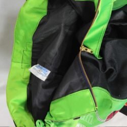 A pair of used black and green Zehetner Sportwear Cross pants in size XXL, featuring a Cross/Vintage style. Made of textile, they are in very good condition with no protectors and are not waterproof.