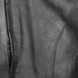 Used Rider-Tec black leather touring jacket with shoulder, elbow, and back protection, ventilation vents, and a combi-jacket connection zipper. Shows minor wear marks.