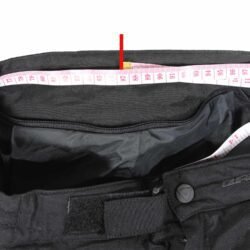 Used Dainese black textile touring trousers with knee and hip protection and a waterproof membrane, showing minor wear marks.