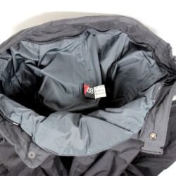 Used Dainese black textile touring trousers with knee and hip protection and a waterproof membrane, showing minor wear marks.