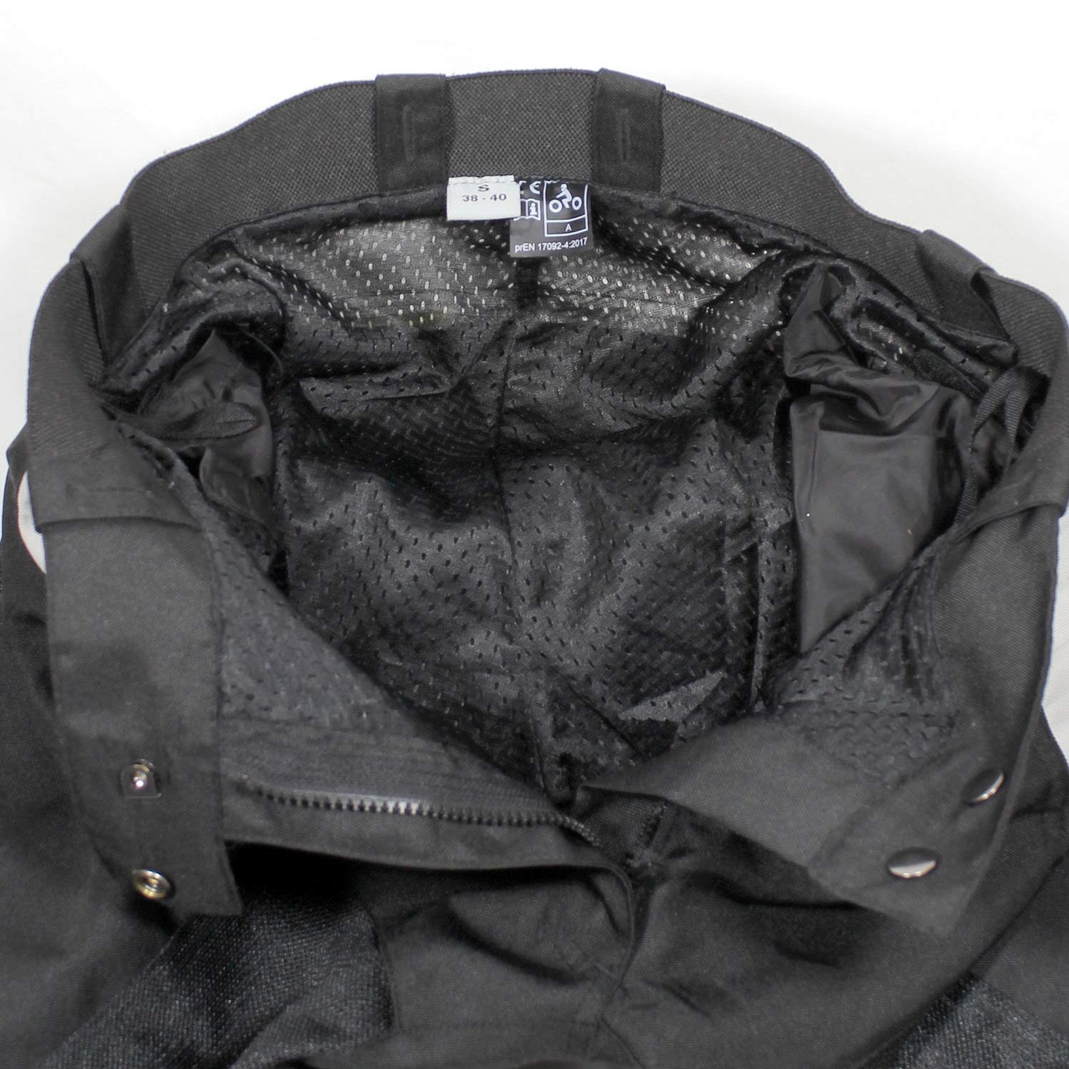 Used FLM black textile touring trousers with knee protection, a short combi-jacket connection zipper, and multiple adjustments for a perfect fit.