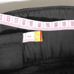 Used Crivit Sports black textile touring trousers with knee protection, a Z-liner waterproof membrane, removable thermal liner, and adjustable shoulder straps.