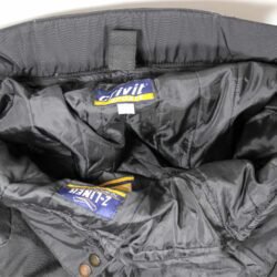 Used Crivit Sports black textile touring trousers with knee protection, a Z-liner waterproof membrane, removable thermal liner, and adjustable shoulder straps.