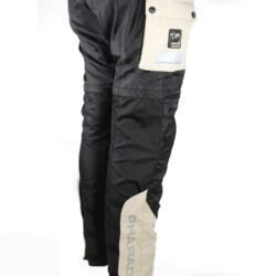 Used Polo Pharao black and crème adventure pants with knee protection, convertible into shorts, featuring large air vents and a combi-jacket connection zipper.