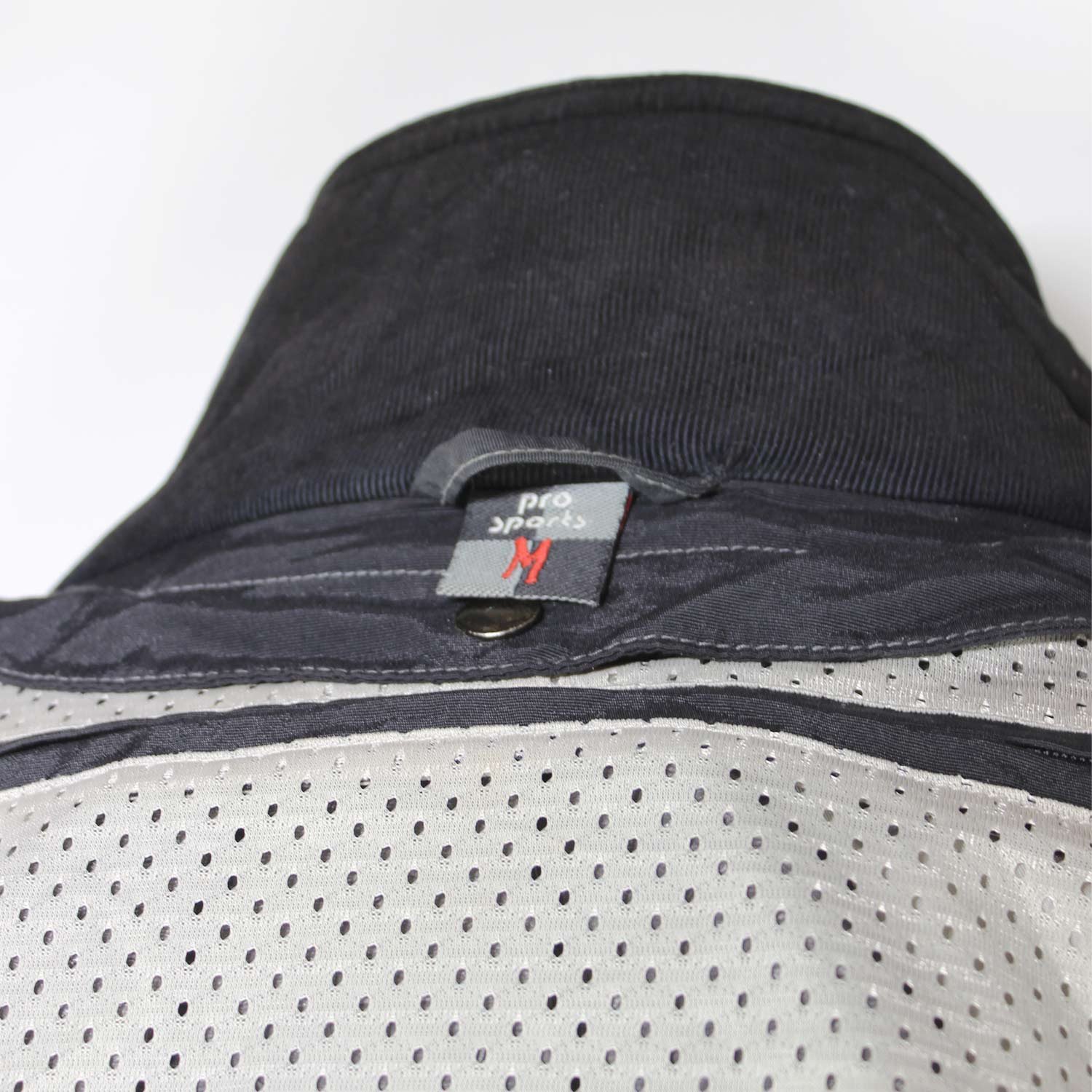 Used Pro Sports black casual textile jacket with Cordura reinforcement on shoulders and elbows, a back protector, ventilation vents, and reflective details.