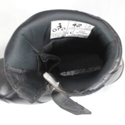 Black Alpinestars Ridge Waterproof touring boots in size 46. Made of synthetic technical material with a double Velcro closure, reinforced shin guard, TPU heel protection, and a vulcanized rubber sole. Features accordion flex zones for mobility and a reflective heel element.