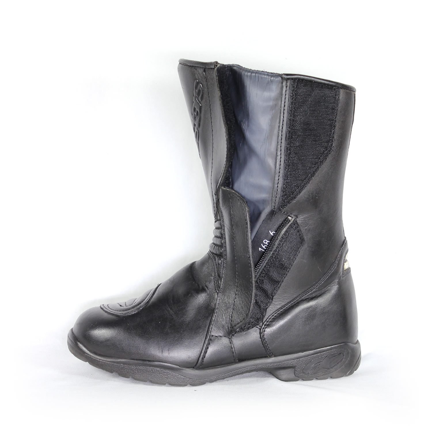 A pair of black leather Alpinestars Touring Classic boots in size 39. The boots feature a Gore-Tex waterproof membrane and protective reinforcements on the toes, shin, ankles, and heel, along with a reinforced sole, gear lever protection, and rear reflectors. They show minor wear marks.
