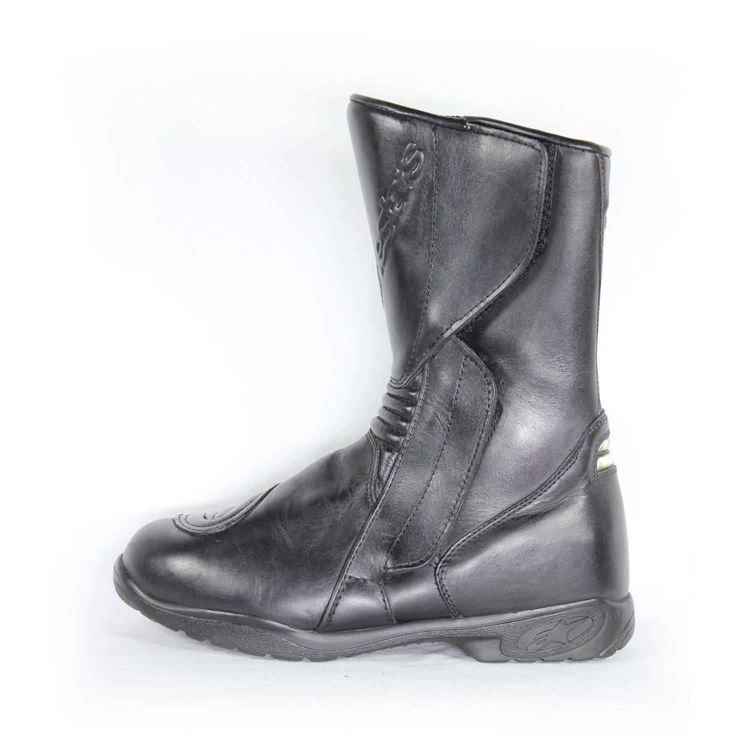 A pair of black leather Alpinestars Touring Classic boots in size 39. The boots feature a Gore-Tex waterproof membrane and protective reinforcements on the toes, shin, ankles, and heel, along with a reinforced sole, gear lever protection, and rear reflectors. They show minor wear marks.