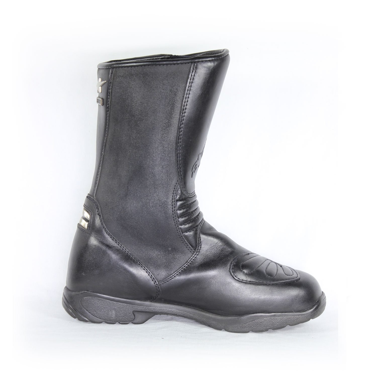 A pair of black leather Alpinestars Touring Classic boots in size 39. The boots feature a Gore-Tex waterproof membrane and protective reinforcements on the toes, shin, ankles, and heel, along with a reinforced sole, gear lever protection, and rear reflectors. They show minor wear marks.