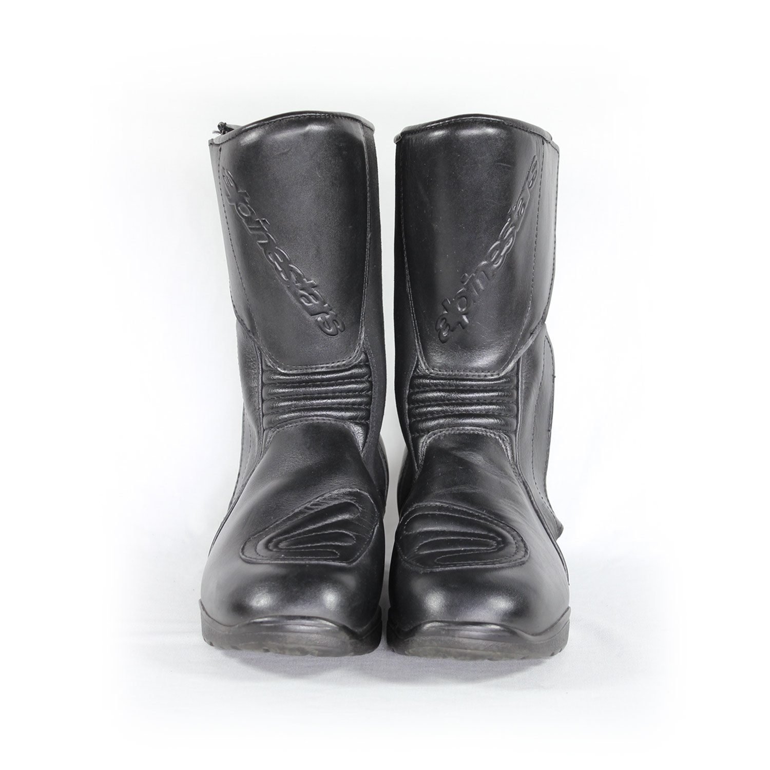 A pair of black leather Alpinestars Touring Classic boots in size 39. The boots feature a Gore-Tex waterproof membrane and protective reinforcements on the toes, shin, ankles, and heel, along with a reinforced sole, gear lever protection, and rear reflectors. They show minor wear marks.