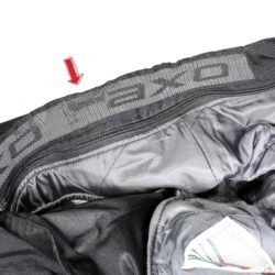 A pair of black AXO textile touring trousers in size 50. They feature a Miporex waterproof membrane and come with protectors for the knees and shins. The trousers are in fairly good condition with some wear marks and a slightly worn elastic waistband.