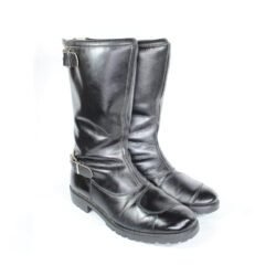 A pair of black, classic vintage-style leather riding boots in size 41. The boots feature a warm, wool-like interior lining, a rear zipper with two buckles, and protective reinforcements on the heel and reinforced sole with gear and brake lever protection. They are in very good condition with minor wear marks.