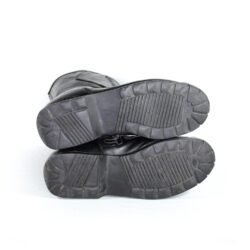 A pair of customized black leather Dainese touring boots in size 40, featuring a unique, artistic paint design applied by the Revver Workshop. The boots offer protection for the toes, shin, ankles, and heel, with a reinforced sole. They show some wear marks and have had the gear and brake lever protectors artistically removed as part of the custom design.