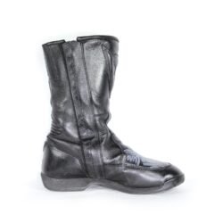 A pair of customized black leather Dainese touring boots in size 40, featuring a unique, artistic paint design applied by the Revver Workshop. The boots offer protection for the toes, shin, ankles, and heel, with a reinforced sole. They show some wear marks and have had the gear and brake lever protectors artistically removed as part of the custom design.