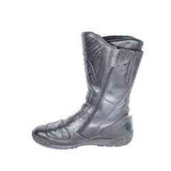 A pair of black leather Gaerne touring boots in size 45. The boots feature protective reinforcements on the toes, shin, ankles, and heels, along with gear and brake lever protection. They are in fairly good condition with some wear marks.