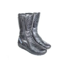 A pair of black leather Gaerne touring boots in size 45. The boots feature protective reinforcements on the toes, shin, ankles, and heels, along with gear and brake lever protection. They are in fairly good condition with some wear marks.
