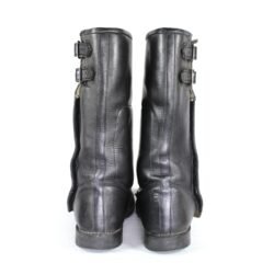 A pair of black, classic vintage leather motorcycle boots by Hein Gericke, size 44. The boots feature a timeless design with reinforced protection on the toes, heels, and a reinforced sole for the gear lever. They are in very good condition with minor use marks on the sole